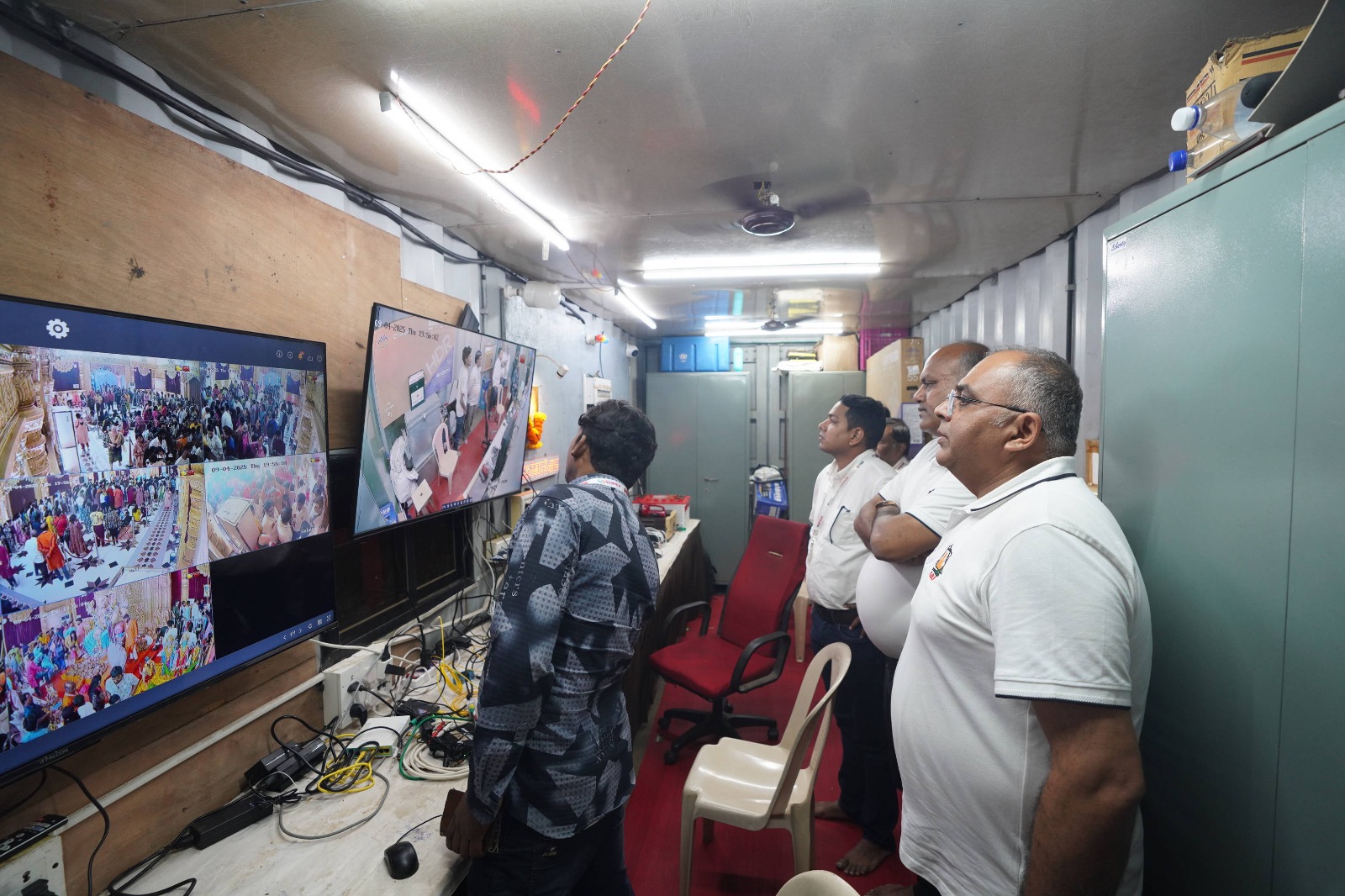 Auditors reviewing CCTV coverage in the mandal control room