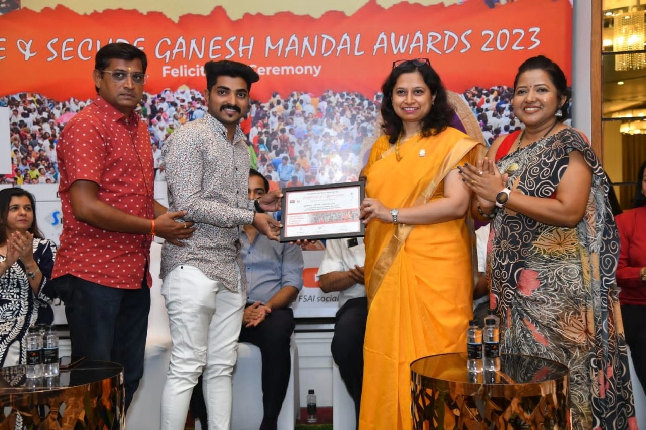 Mandal volunteers receiving a certificate of appreciation
