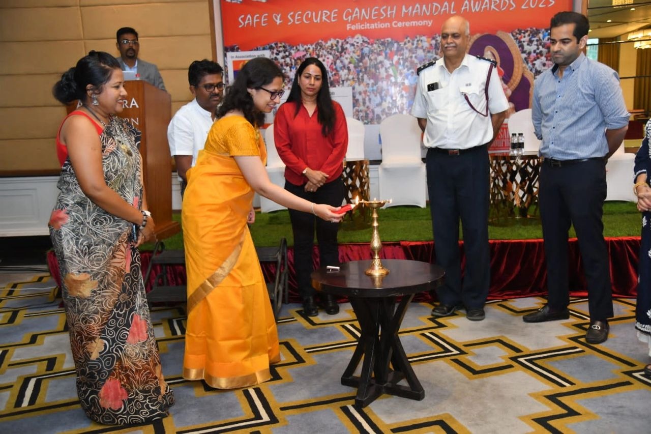 Lamp lighting at the Safe & Secure Ganesh Mandal Awards felicitation ceremony